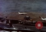 Image of Variety of  U.S. Navy aircraft landing on the USS Forrestal at sea Atlantic Ocean, 1959, second 30 stock footage video 65675042344
