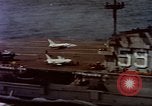 Image of Variety of  U.S. Navy aircraft landing on the USS Forrestal at sea Atlantic Ocean, 1959, second 31 stock footage video 65675042344