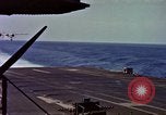 Image of Variety of  U.S. Navy aircraft landing on the USS Forrestal at sea Atlantic Ocean, 1959, second 32 stock footage video 65675042344
