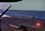 Image of Variety of  U.S. Navy aircraft landing on the USS Forrestal at sea Atlantic Ocean, 1959, second 33 stock footage video 65675042344