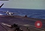 Image of Variety of  U.S. Navy aircraft landing on the USS Forrestal at sea Atlantic Ocean, 1959, second 35 stock footage video 65675042344