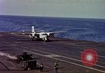 Image of Variety of  U.S. Navy aircraft landing on the USS Forrestal at sea Atlantic Ocean, 1959, second 36 stock footage video 65675042344