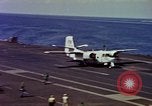 Image of Variety of  U.S. Navy aircraft landing on the USS Forrestal at sea Atlantic Ocean, 1959, second 38 stock footage video 65675042344