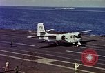 Image of Variety of  U.S. Navy aircraft landing on the USS Forrestal at sea Atlantic Ocean, 1959, second 40 stock footage video 65675042344