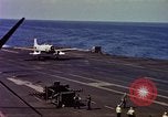 Image of Variety of  U.S. Navy aircraft landing on the USS Forrestal at sea Atlantic Ocean, 1959, second 42 stock footage video 65675042344
