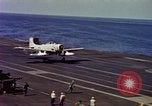 Image of Variety of  U.S. Navy aircraft landing on the USS Forrestal at sea Atlantic Ocean, 1959, second 43 stock footage video 65675042344