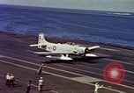 Image of Variety of  U.S. Navy aircraft landing on the USS Forrestal at sea Atlantic Ocean, 1959, second 44 stock footage video 65675042344