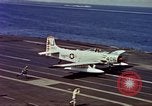 Image of Variety of  U.S. Navy aircraft landing on the USS Forrestal at sea Atlantic Ocean, 1959, second 45 stock footage video 65675042344