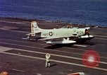 Image of Variety of  U.S. Navy aircraft landing on the USS Forrestal at sea Atlantic Ocean, 1959, second 48 stock footage video 65675042344