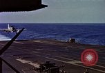 Image of Variety of  U.S. Navy aircraft landing on the USS Forrestal at sea Atlantic Ocean, 1959, second 49 stock footage video 65675042344