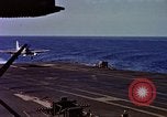 Image of Variety of  U.S. Navy aircraft landing on the USS Forrestal at sea Atlantic Ocean, 1959, second 50 stock footage video 65675042344