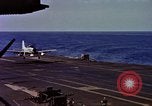Image of Variety of  U.S. Navy aircraft landing on the USS Forrestal at sea Atlantic Ocean, 1959, second 51 stock footage video 65675042344