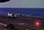 Image of Variety of  U.S. Navy aircraft landing on the USS Forrestal at sea Atlantic Ocean, 1959, second 52 stock footage video 65675042344