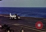 Image of Variety of  U.S. Navy aircraft landing on the USS Forrestal at sea Atlantic Ocean, 1959, second 53 stock footage video 65675042344