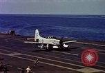 Image of Variety of  U.S. Navy aircraft landing on the USS Forrestal at sea Atlantic Ocean, 1959, second 55 stock footage video 65675042344