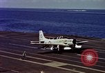 Image of Variety of  U.S. Navy aircraft landing on the USS Forrestal at sea Atlantic Ocean, 1959, second 57 stock footage video 65675042344