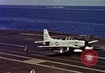 Image of Variety of  U.S. Navy aircraft landing on the USS Forrestal at sea Atlantic Ocean, 1959, second 59 stock footage video 65675042344