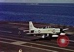 Image of Variety of  U.S. Navy aircraft landing on the USS Forrestal at sea Atlantic Ocean, 1959, second 60 stock footage video 65675042344