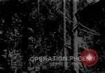 Image sud-vietnamiens soldats patrouillent village Vietnam, 1970, de la seconde 12 séquences d'archives historiques vidéo 65675042355