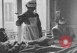 Image of injured soldier France, 1918, second 31 stock footage video 65675042388