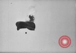 Image of German aircraft downed World War 1 with captured pilot France, 1918, second 14 stock footage video 65675042391