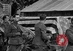 Image of WWI American soldiers at a funeral France, 1918, second 49 stock footage video 65675042397