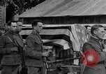 Image of WWI American soldiers at a funeral France, 1918, second 51 stock footage video 65675042397
