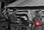Image of WWI American soldiers at a funeral France, 1918, second 52 stock footage video 65675042397