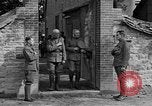 Image of WWI American soldiers at a funeral France, 1918, second 59 stock footage video 65675042397