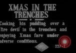 Image of British soldiers sharing Christmas pudding in trenches France, 1916, second 4 stock footage video 65675042463