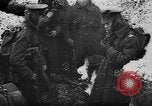 Image of British soldiers sharing Christmas pudding in trenches France, 1916, second 8 stock footage video 65675042463