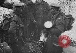 Image of British soldiers sharing Christmas pudding in trenches France, 1916, second 11 stock footage video 65675042463