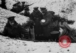 Image of British soldiers sharing Christmas pudding in trenches France, 1916, second 13 stock footage video 65675042463