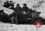 Image of British soldiers sharing Christmas pudding in trenches France, 1916, second 14 stock footage video 65675042463