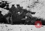 Image of British soldiers sharing Christmas pudding in trenches France, 1916, second 16 stock footage video 65675042463