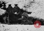 Image of British soldiers sharing Christmas pudding in trenches France, 1916, second 17 stock footage video 65675042463