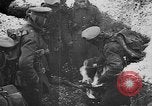 Image of British soldiers sharing Christmas pudding in trenches France, 1916, second 21 stock footage video 65675042463