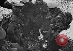 Image of British soldiers sharing Christmas pudding in trenches France, 1916, second 22 stock footage video 65675042463