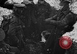 Image of British soldiers sharing Christmas pudding in trenches France, 1916, second 23 stock footage video 65675042463