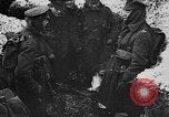Image of British soldiers sharing Christmas pudding in trenches France, 1916, second 25 stock footage video 65675042463