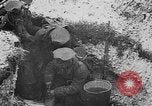 Image of British soldiers sharing Christmas pudding in trenches France, 1916, second 36 stock footage video 65675042463