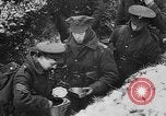 Image of British soldiers sharing Christmas pudding in trenches France, 1916, second 39 stock footage video 65675042463