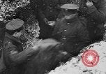 Image of British soldiers sharing Christmas pudding in trenches France, 1916, second 42 stock footage video 65675042463
