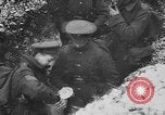 Image of British soldiers sharing Christmas pudding in trenches France, 1916, second 44 stock footage video 65675042463