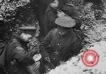Image of British soldiers sharing Christmas pudding in trenches France, 1916, second 46 stock footage video 65675042463