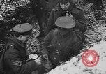 Image of British soldiers sharing Christmas pudding in trenches France, 1916, second 49 stock footage video 65675042463
