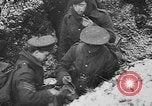 Image of British soldiers sharing Christmas pudding in trenches France, 1916, second 50 stock footage video 65675042463