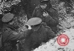 Image of British soldiers sharing Christmas pudding in trenches France, 1916, second 51 stock footage video 65675042463