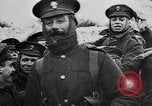Image of British soldiers sharing Christmas pudding in trenches France, 1916, second 53 stock footage video 65675042463