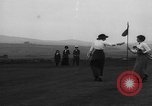 Standbild Frauen und einem Mann indem auf eine Golf Green Vereinigtes Königreich, 1916, aus Sekunde 19 historischem Filmmaterial Videoclip 65675042466